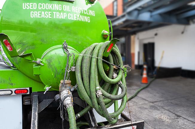 workers at Grease Trap Cleaning of Gardner